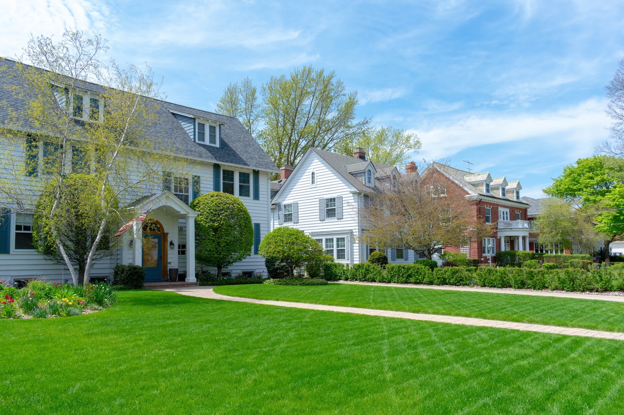 Traditional suburban homes with green front lawns Home Inspection Dearborn MI